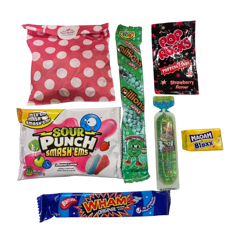 Assorted candy packages including Sour Punch Smash'ems, Pop Rocks, and Maam Bloxx on a white background