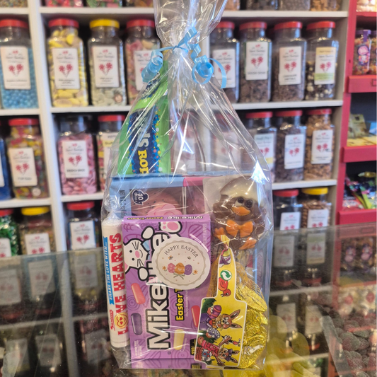Gift basket with Easter-themed items in a store setting