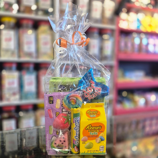 Gourmet gift basket with candy and snacks in a store setting